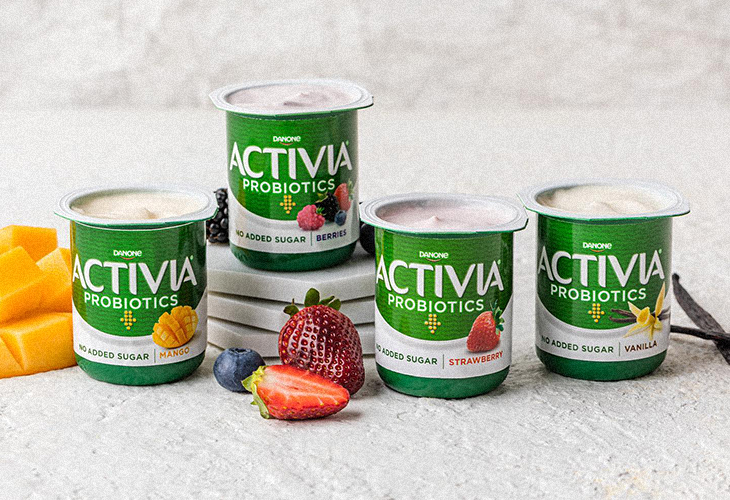 Activia tubs opened with fruit